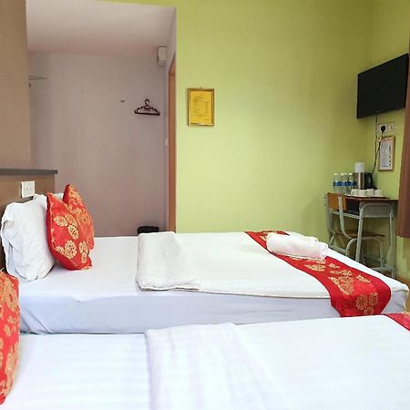 Oyo 90964 Melody 88 Inn Miri Bagian luar foto