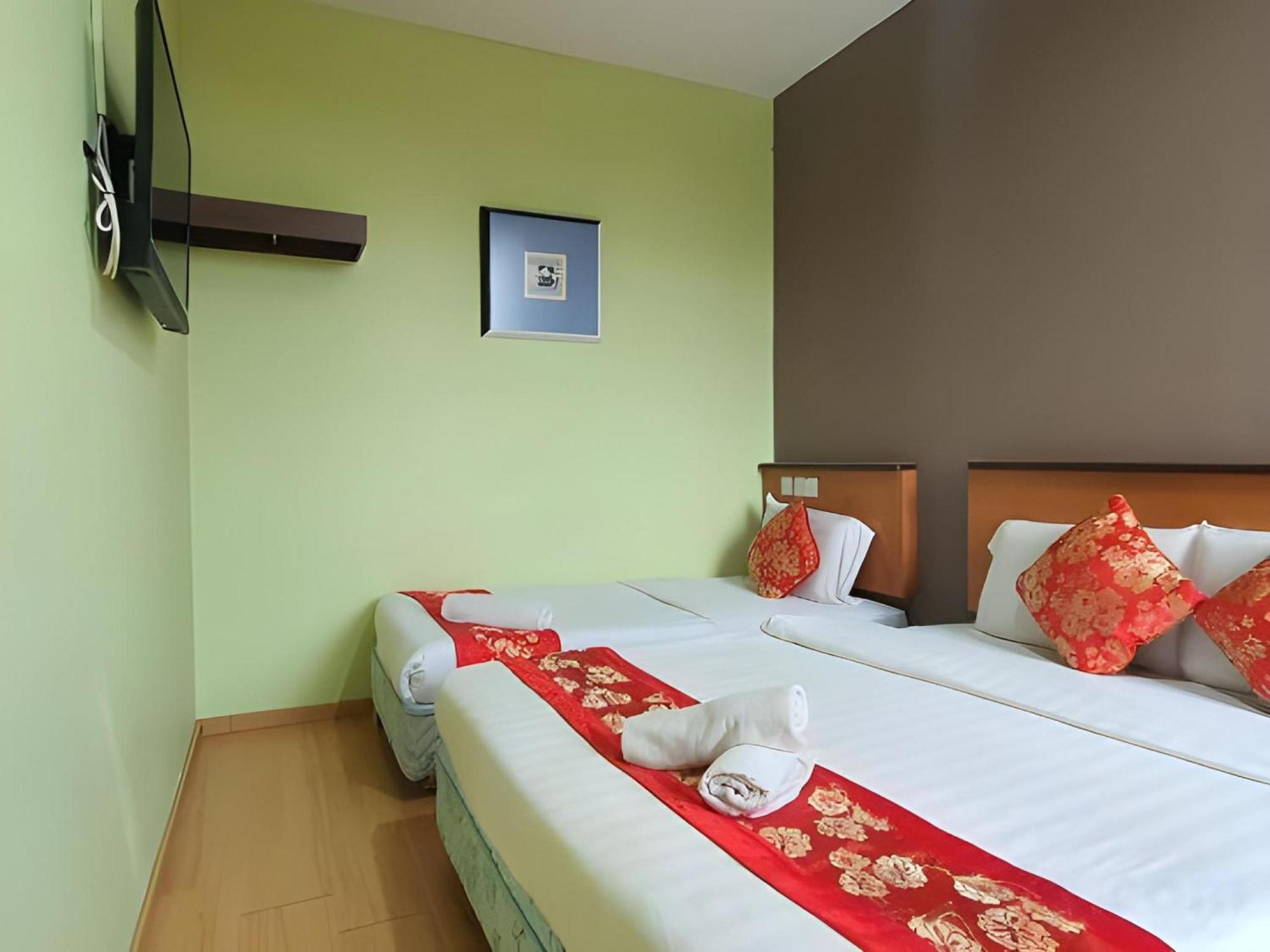 Oyo 90964 Melody 88 Inn Miri Bagian luar foto