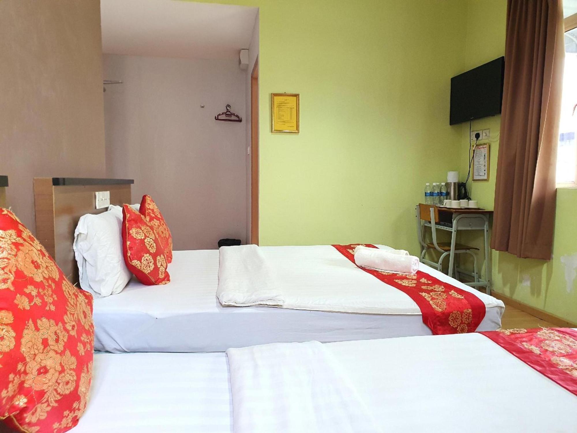 Oyo 90964 Melody 88 Inn Miri Bagian luar foto