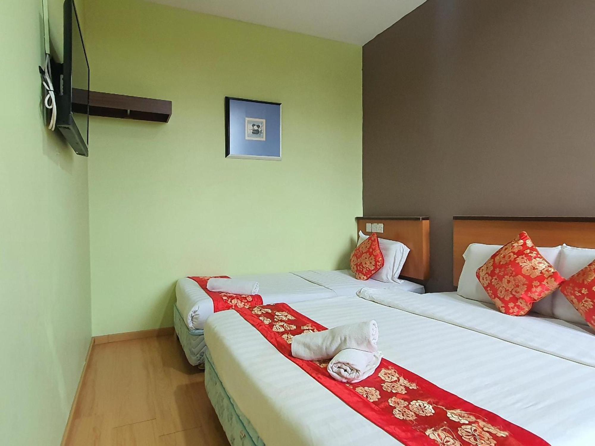 Oyo 90964 Melody 88 Inn Miri Bagian luar foto