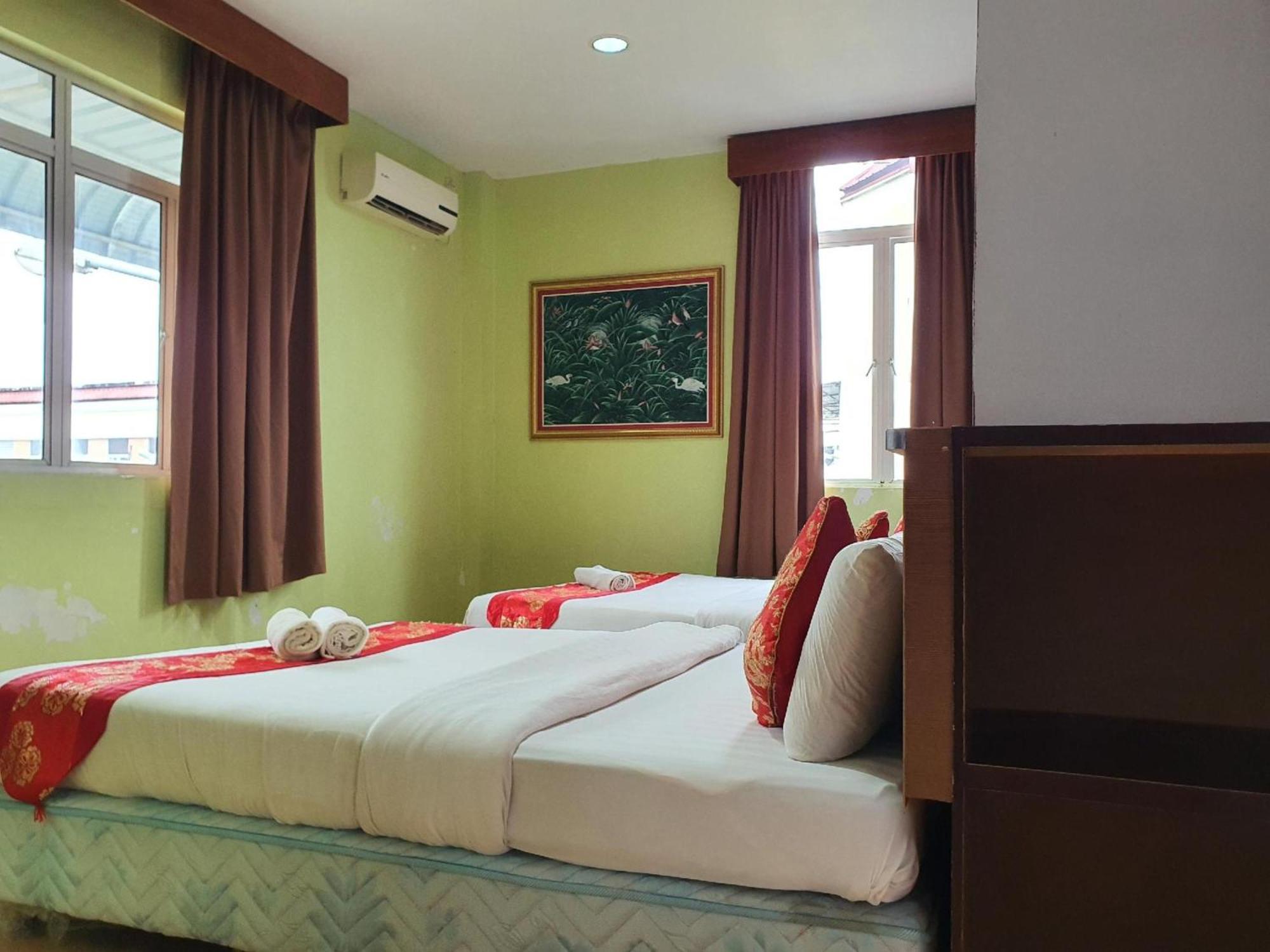 Oyo 90964 Melody 88 Inn Miri Bagian luar foto