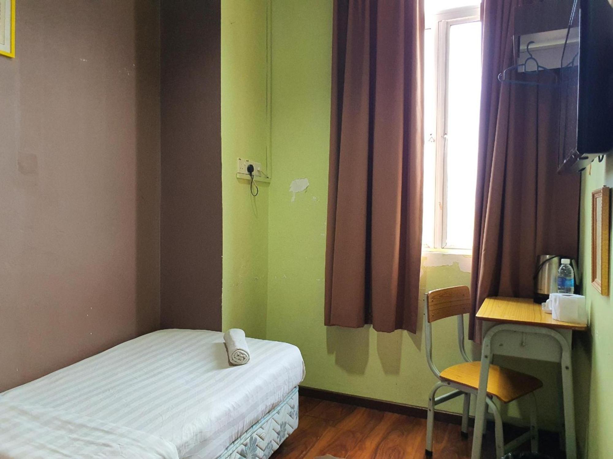 Oyo 90964 Melody 88 Inn Miri Bagian luar foto