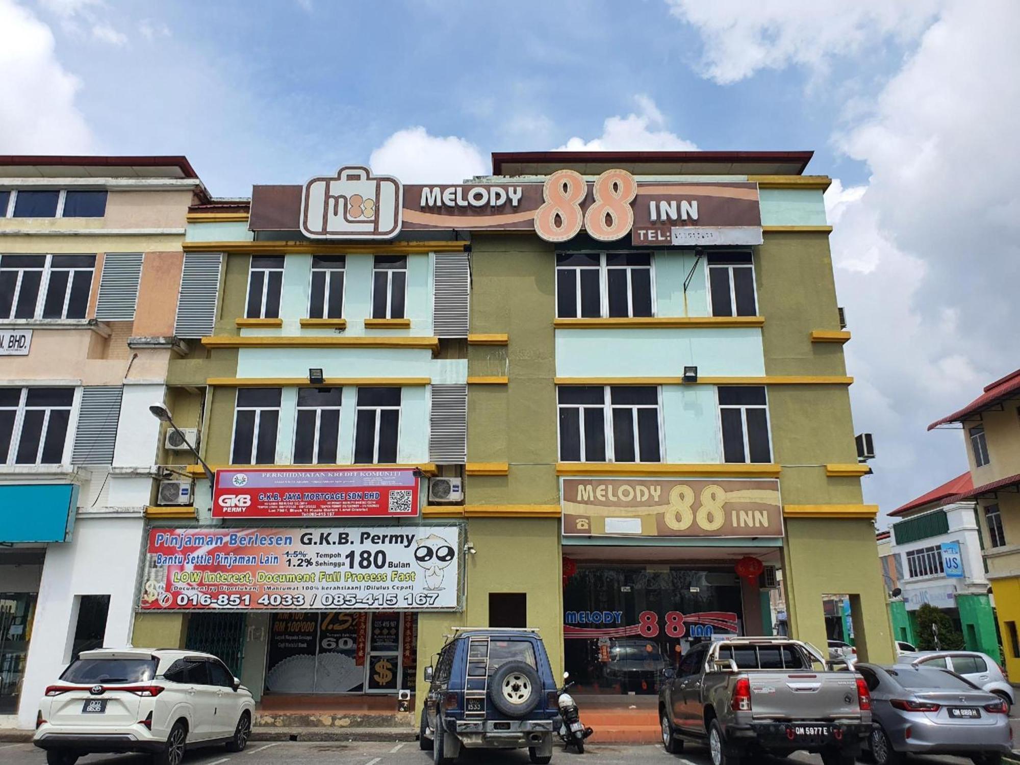 Oyo 90964 Melody 88 Inn Miri Bagian luar foto